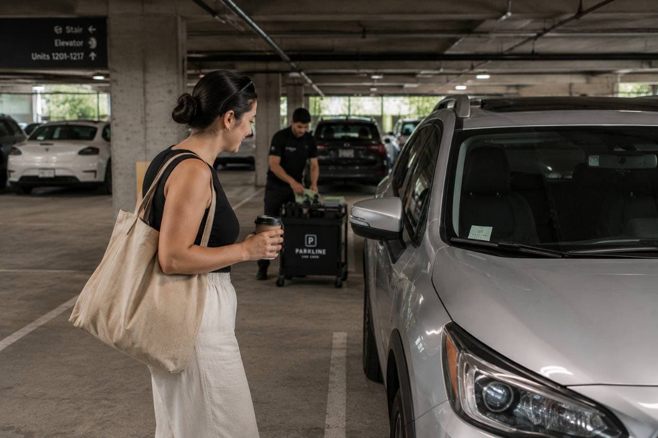 Resident arriving at her vehicle in an apartment parking garage